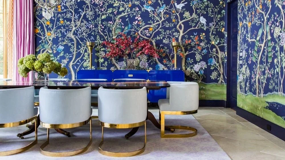 High-end Houston family room with custom bar, brass lighting, and contemporary furnishings at the Timberwilde residence.