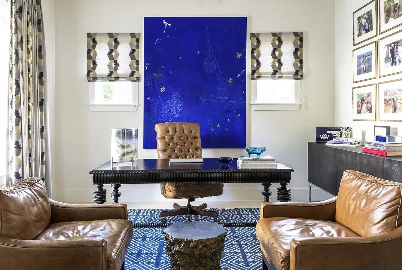 Full-service residential interior design for a luxury home office with statement art, tailored furnishings, and a polished executive feel
