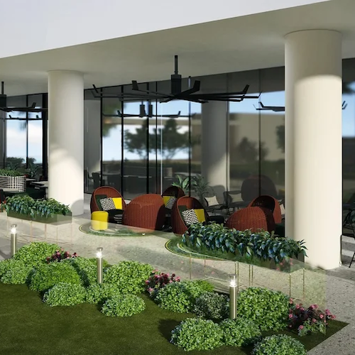Hospitality interior design for a luxury hotel terrace in Houston with outdoor lounge seating and landscaped planters