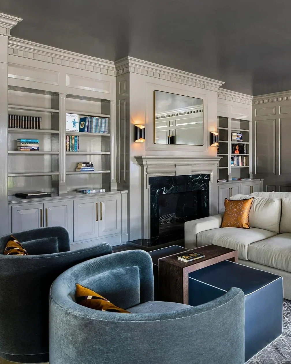 Luxury residential interior design in Houston at Sydenham featuring curated artwork and contemporary architectural entry space.